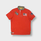 Ralph Lauren polo shirt in red with embroidered patches and wooden collar toggle