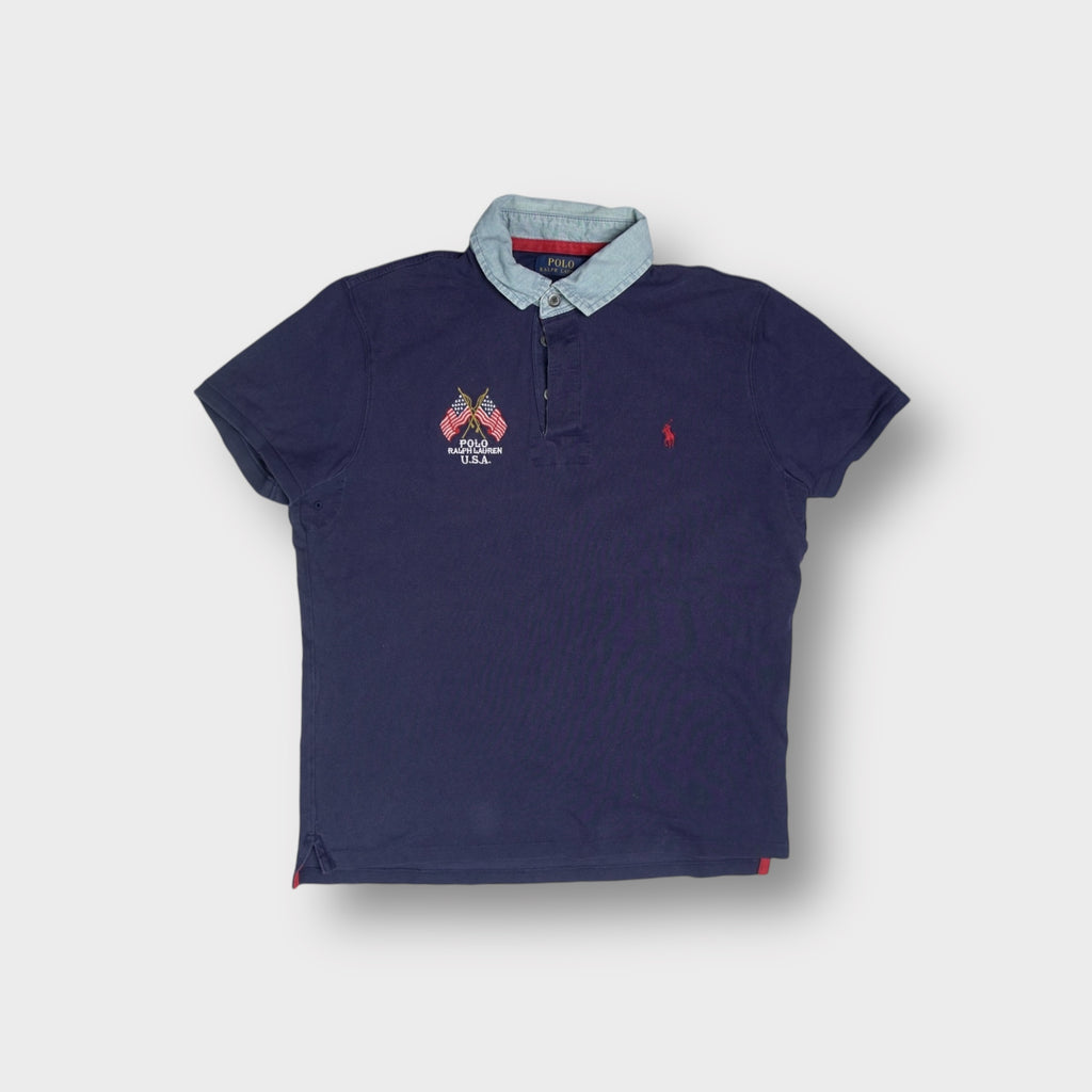 Ralph Lauren navy blue polo shirt with a light denim collar and embroidered flags