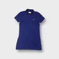 Blue Lacoste Sport polo dress featuring a contrast navy collar and crocodile embroidery