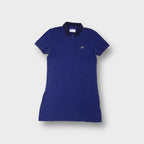 Blue Lacoste Sport polo dress featuring a contrast navy collar and crocodile embroidery
