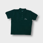 Jaguar dark green polo shirt featuring white embroidered emblem on left chest