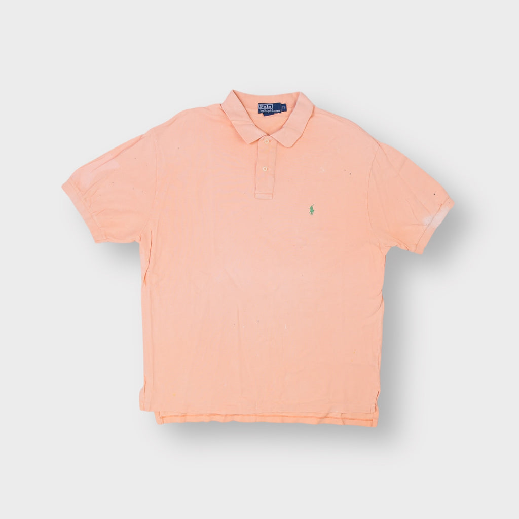 Ralph Lauren polo shirt in orange with an embroidered green pony logo on the chest