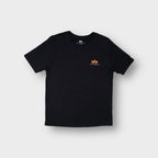 Alpha Industries T-Shirt in black featuring an orange chest logo print
