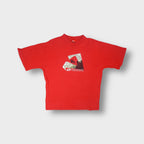 Rip Curl T-Shirt in red with a printed skate graphic design across the front chest.