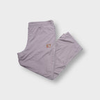Nike LeBron James trackpants in grey with bronze L23 logo embroidered on the thigh