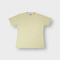 Yellow Reebok V-neck T-Shirt featuring a small embroidered logo on the chest