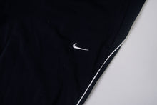 Load image into Gallery viewer, Vintage Nike Trackpants | L