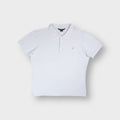 Porsche Design polo shirt in white with a metallic chest logo emblem and collar.