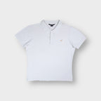 Porsche Design polo shirt in white with a metallic chest logo emblem and collar.
