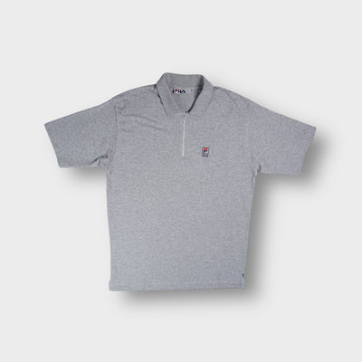 Grey Fila polo shirt with a half-zip placket and embroidered chest logo