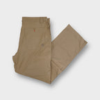 Timberland beige convertible pants with zip-off legs and back pocket detail