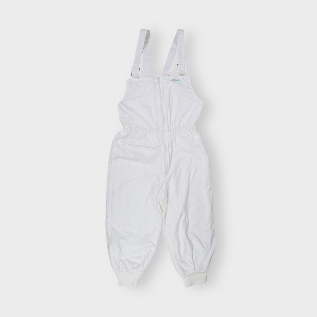Adidas white dungarees featuring an embroidered teal Trefoil chest logo