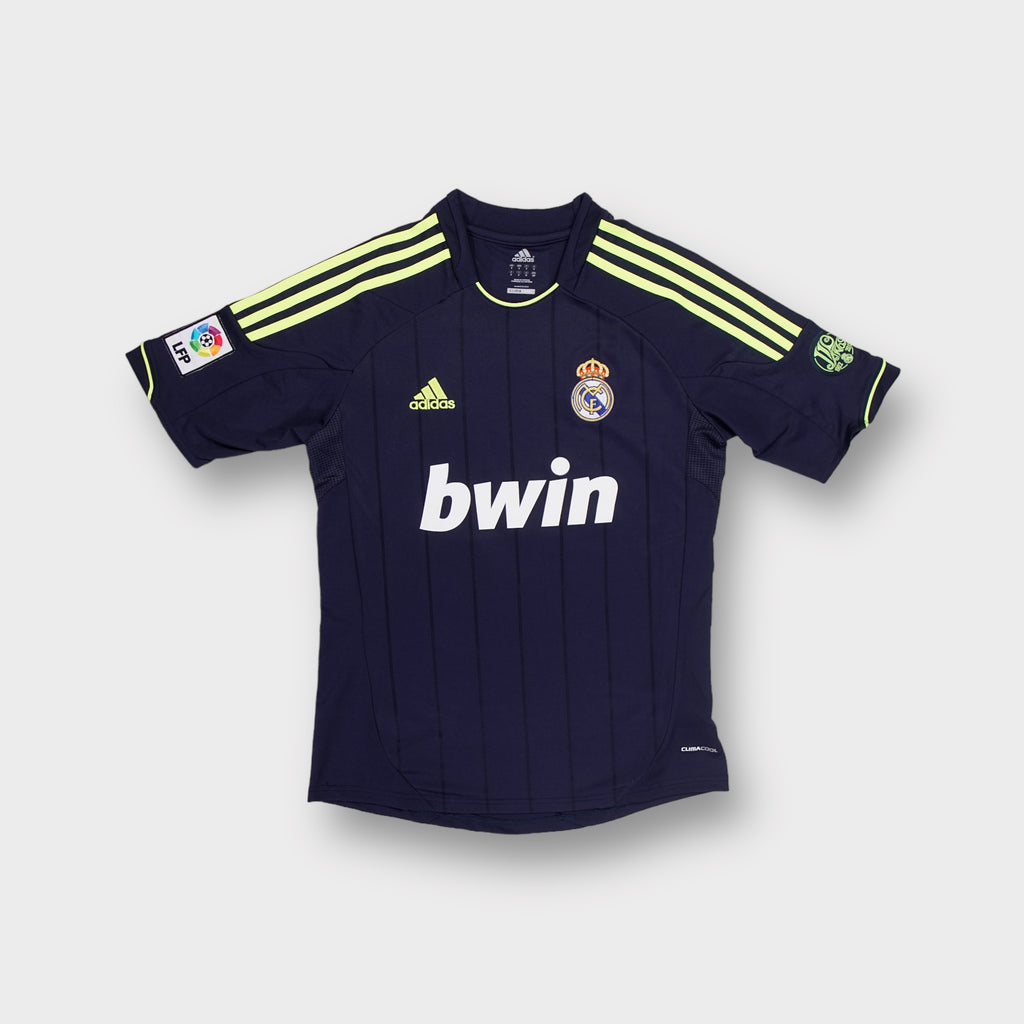 Adidas Real Madrid blue football jersey with yellow shoulder stripes and front Bwin print