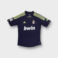 Adidas Real Madrid blue football jersey with yellow shoulder stripes and front Bwin print