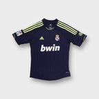 Adidas Real Madrid blue football jersey with yellow shoulder stripes and front Bwin print
