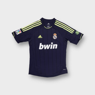 Adidas Real Madrid blue football jersey with yellow shoulder stripes and front Bwin print