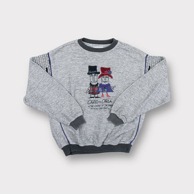 Grey Carlo Colucci sweater featuring a Carlo and Carla embroidered character graphic.