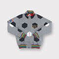 Nike grey full-zip jacket featuring a football panel pattern and embroidered chest logo