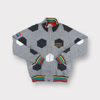 Nike grey full-zip jacket featuring a football panel pattern and embroidered chest logo