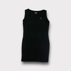 Black Lacoste sleeveless dress with an embroidered crocodile patch on chest
