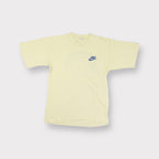 Nike yellow T-Shirt with a blue chest swoosh logo and a colorful rainbow star graphic