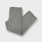 Nike khaki trackpants with embroidered swoosh and olive green leg stripe detail