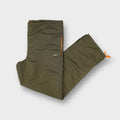 Nike trackpants in olive green with orange trim and small silver swoosh logo