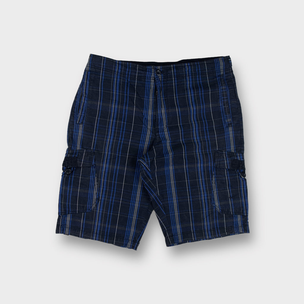 Nike shorts in blue plaid pattern featuring side cargo pockets and button closure