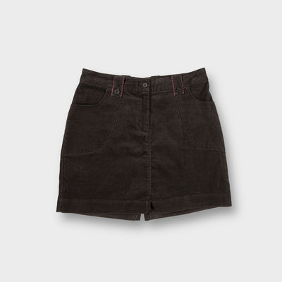 Brown Nike corduroy mini skirt showing pink stitched trim and back swoosh logo