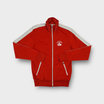 Nike track jacket in red with white shoulder tape and chest graphic