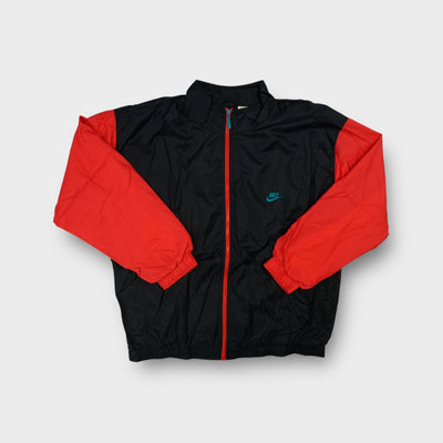 Nike track jacket in black and red featuring a teal embroidered chest logo and red front zip