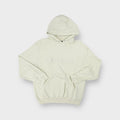 Champion sweater hoodie in beige with embroidered raised logo script on the chest.
