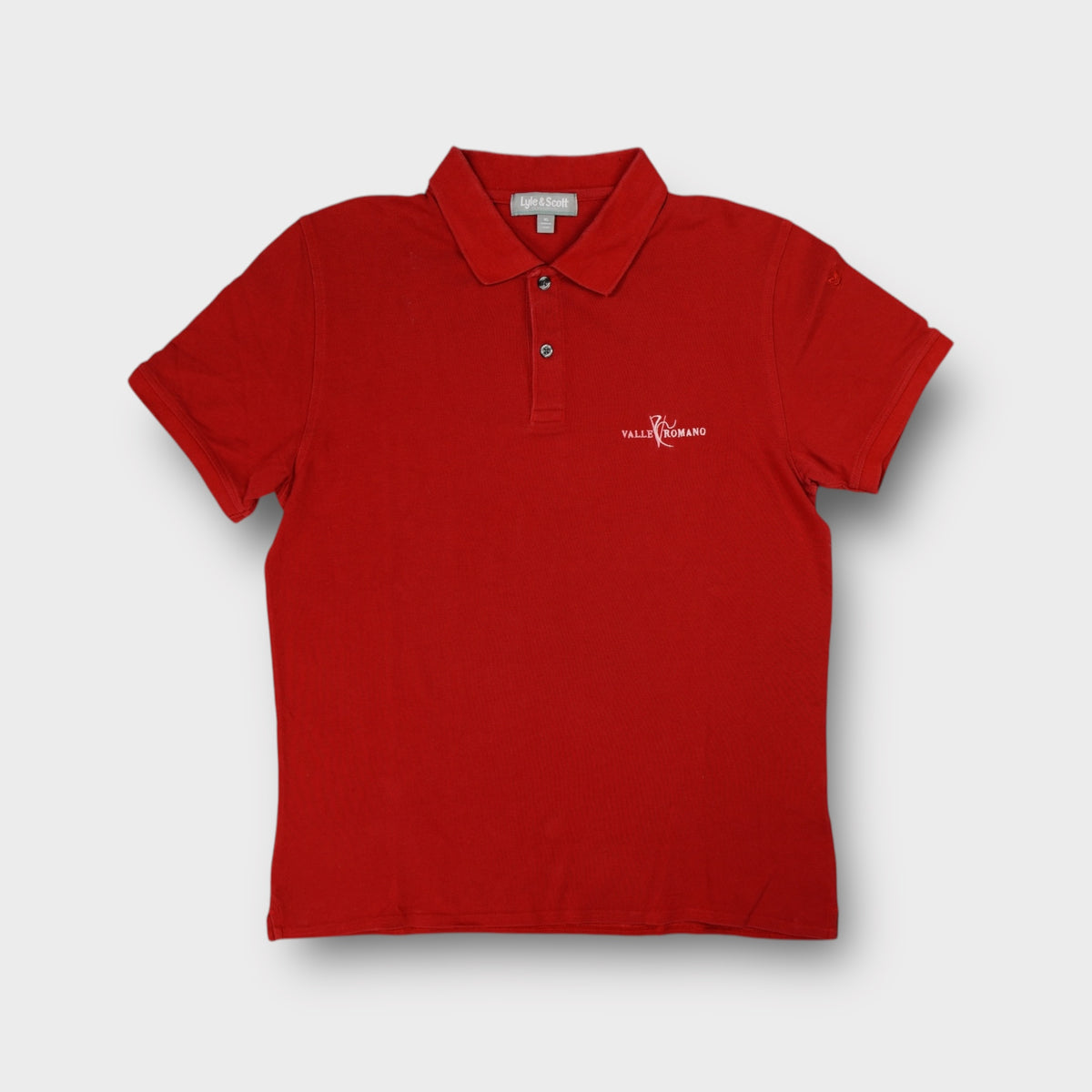 Red Lyle & Scott polo shirt featuring white Valle Romano embroidery on the chest