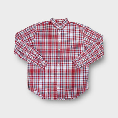 Ralph Lauren long-sleeve red plaid shirt with an embroidered polo player logo on the chest.