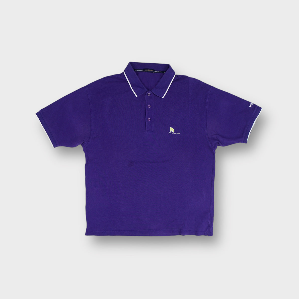 Henri Lloyd polo shirt in purple with contrast white collar trim and chest logo