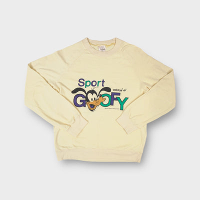 Adidas yellow crewneck sweater featuring a front Sport Goofy print with Trefoil logo.