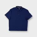 Dickies polo shirt in blue featuring a chest pocket and buttoned collar