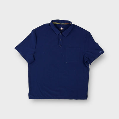 Dickies polo shirt in blue featuring a chest pocket and buttoned collar