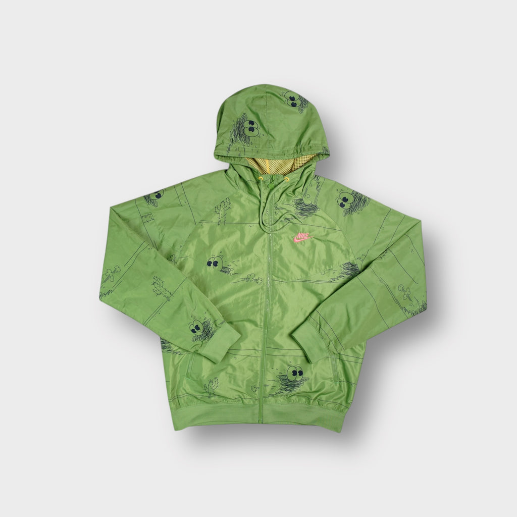 Green Nike full-zip hooded jacket featuring Misha Hollenbach cartoon graphic print