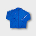 Blue Nike track jacket with white sleeve stripes and an embroidered chest logo
