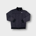 Nike full-zip track jacket in grey featuring embroidered chest logo and dark piping.