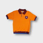 Nike FC Barcelona polo shirt in orange with embroidered crest patch and collar