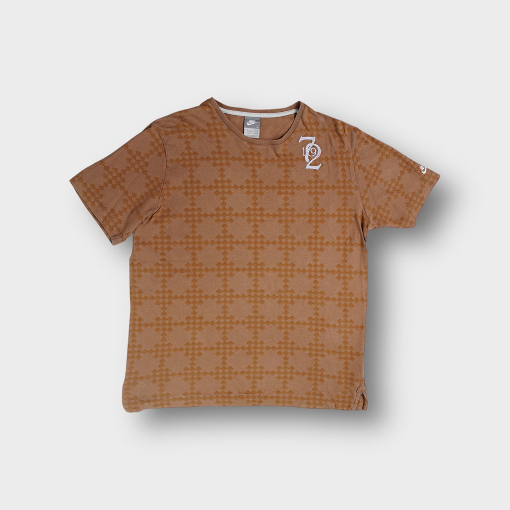 Brown Nike patterned T-Shirt featuring embroidered 1972 chest graphic