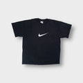 Nike T-Shirt in black featuring a printed white swoosh logo on the center chest