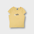 Yellow Nike cap-sleeve T-Shirt with a white swoosh and black cursive chest logo