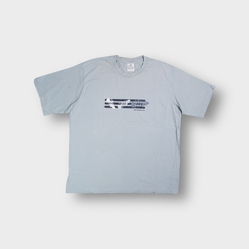 Adidas T-Shirt in grey featuring a central football boots graphic and three stripes