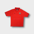 Nike FC Barcelona polo shirt in red featuring an embroidered team crest on the chest.