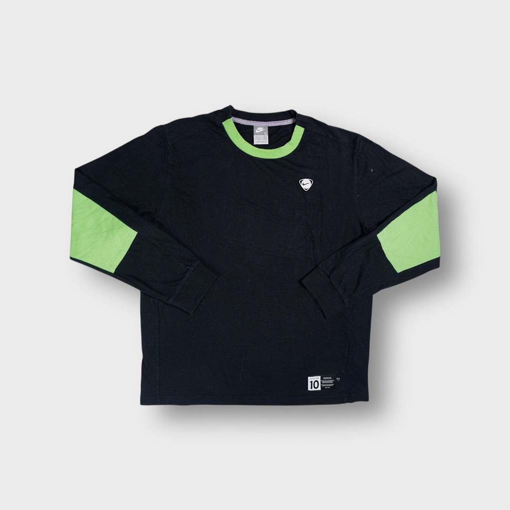 Nike sweater in black with green collar trim and a Playmaker number 10 patch at the hem