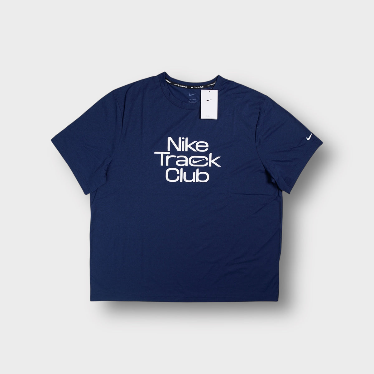 Nike T-Shirt in navy blue with white Nike Track Club graphic print on the front