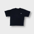 Nike T-Shirt in black featuring a white embroidered swoosh logo on the left chest
